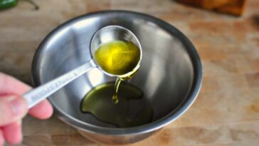 Is taking 2 tablespoons of olive oil a day good for you?
