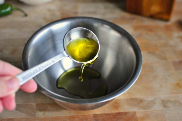 Is taking 2 tablespoons of olive oil a day good for you?