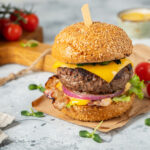 Should I grill burgers covered or uncovered?