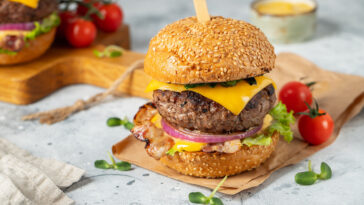 Should I grill burgers covered or uncovered?