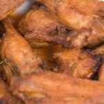 Should I season wings before frying?