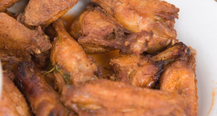 Should I season wings before frying?