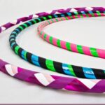 Should I wear a waist trainer while hula hooping?