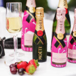 What are mini champagne bottles called?