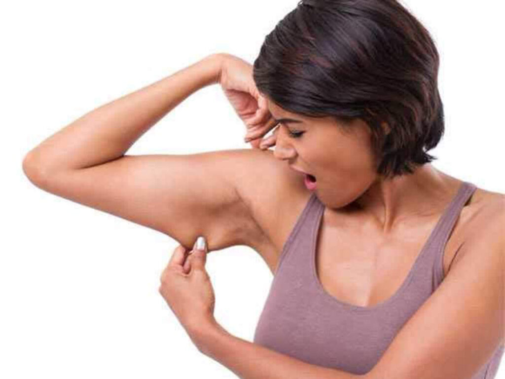 What causes arm fat in females?
