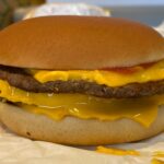 What comes on a McDonald's triple cheeseburger?
