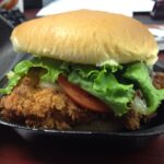 What comes on a spicy chicken sandwich from Chick-fil-A?