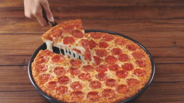 What does Pizza Hut put on their crust?