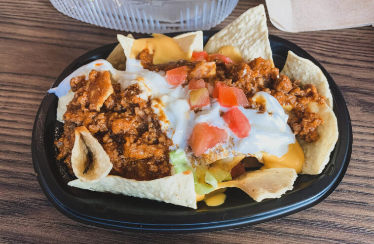 What does Taco Bell put on their tostadas?