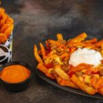 What does the Nacho Fries box come with?