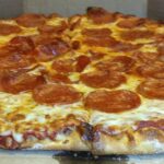 What is Brooklyn style pizza vs thin crust?
