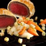 What is Ramsay's signature dish?