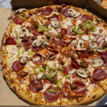 What is a deluxe pizza from Dominos?