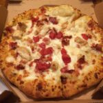 What is on a Dominos Cali chicken bacon Ranch pizza?