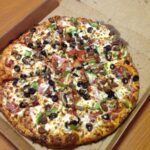 What is on a Domino's extravaganza pizza?