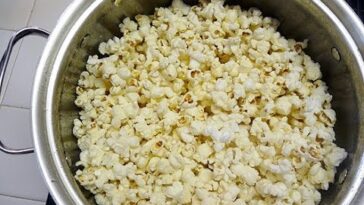 What is the best way to put butter on popcorn?