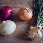 What is the difference between onion sets and onion plants?
