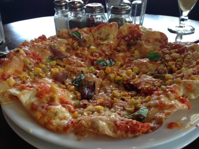 What is the most common vegetable on pizza?