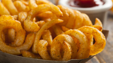 What makes curly fries taste different?