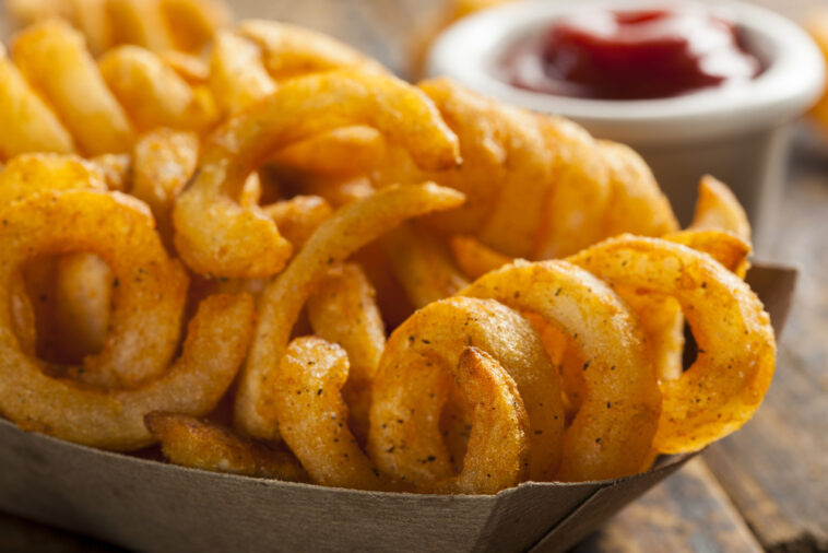 What makes curly fries taste different?