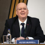 What nationality is Murrell?