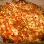 What sauce is on Buffalo chicken pizza Domino's?