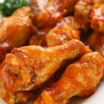 What temperature do you reheat wings in the oven?