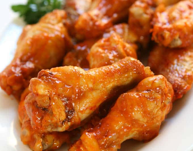 What temperature do you reheat wings in the oven?