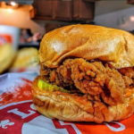 Which countries does Popeyes operate in?