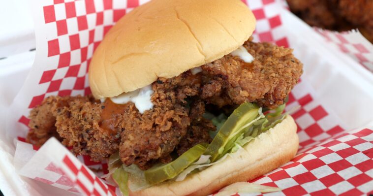 Who bought out Popeyes chicken?