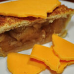 Who puts cheese on an apple pie?