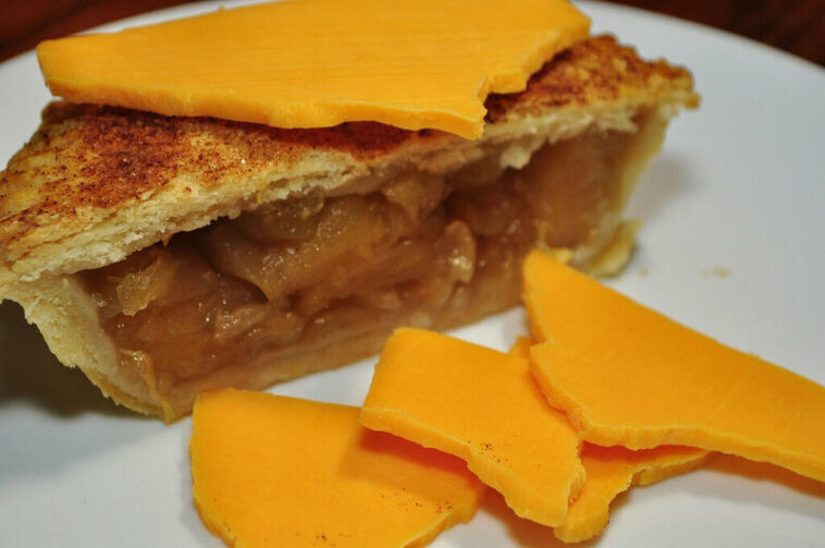 Who puts cheese on an apple pie?