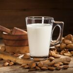 Who should not drink almond milk?