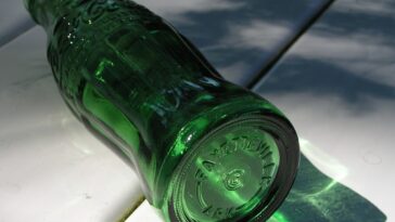 Why are Coke bottles green?
