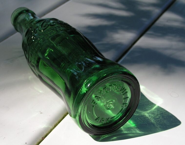 Why are Coke bottles green?