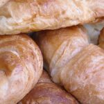 Why are croissants popular in France?