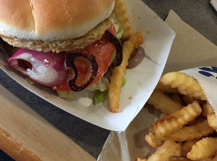 Why are grilled onions not vegetarian?