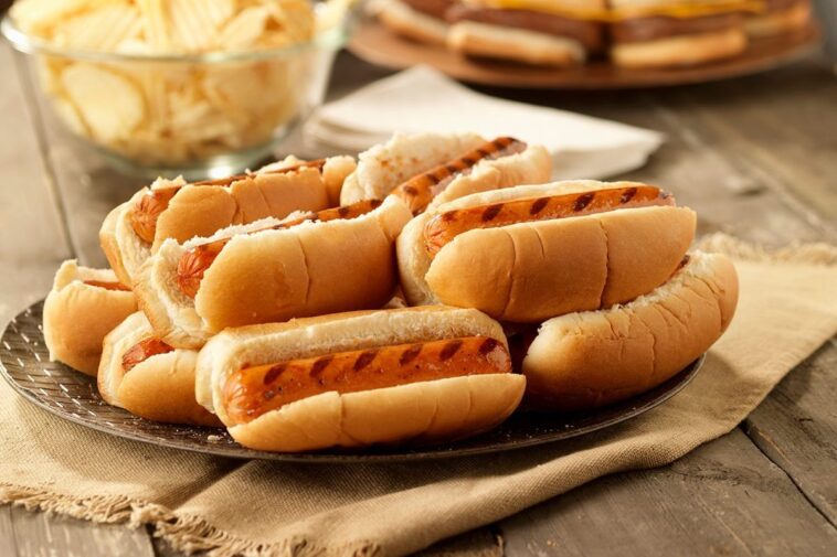 Why are there 8 buns and 10 hot dogs?