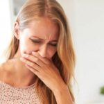 Why do I feel sick after drinking eggnog?