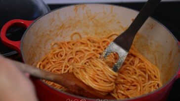 Why do you put butter in spaghetti sauce?