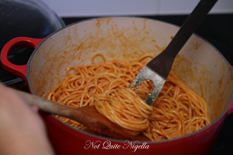 Why do you put butter in spaghetti sauce?