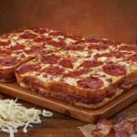 Why does Little Caesars say Pizza Pizza?