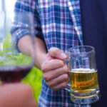 Why does beer give me stomach cramps?