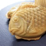 Why is taiyaki shaped like a fish?