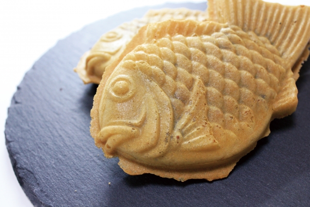 Why is taiyaki shaped like a fish?
