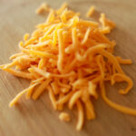 Why you need to stop buying shredded cheese?