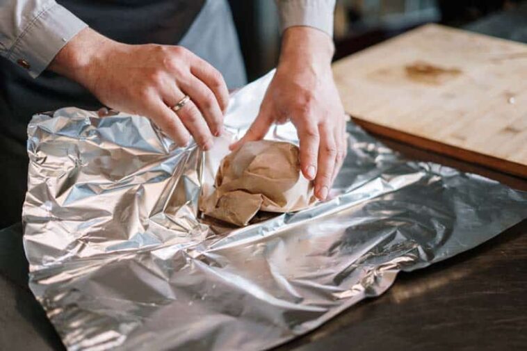 Can you store cheese in aluminum foil?