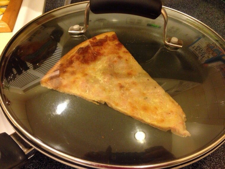 How do you reheat pizza so it's crispy?