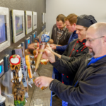 How do you serve beer at a bar?