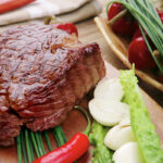 What are the disadvantages of grass-fed beef?